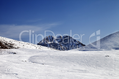 Ski slope at sunny day