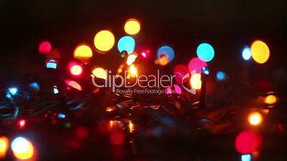 colorful flashing christmas lights and reflection seamless loop