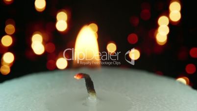 burning candle and christmas lights bokeh loopable