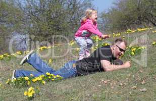 Father and daughter playing in the park