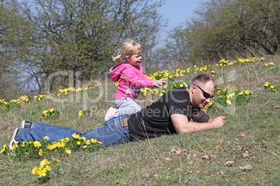 Father and daughter playing in the park
