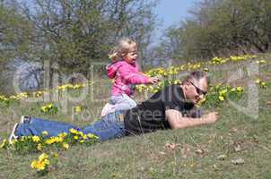 Father and daughter playing in the park