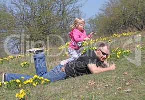 Father and daughter playing in the park