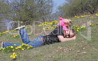 Father and daughter playing in the park