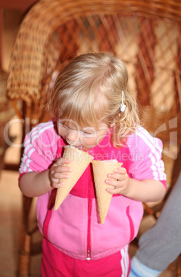 Portrait of young girl eating ice-cream