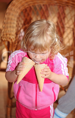 Portrait of young girl eating ice-cream