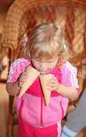 Portrait of young girl eating ice-cream