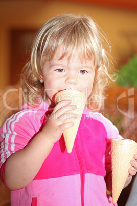 Portrait of young girl eating ice-cream