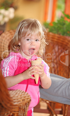 Portrait of young girl eating ice-cream