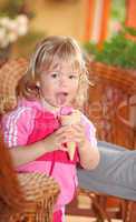 Portrait of young girl eating ice-cream