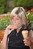 Portrait of young woman eating ice-cream