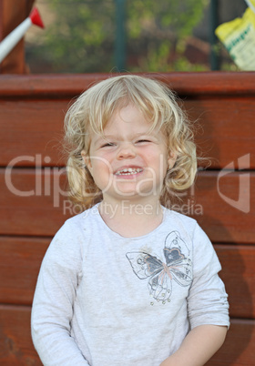 Portrait of a happy little girl close-up