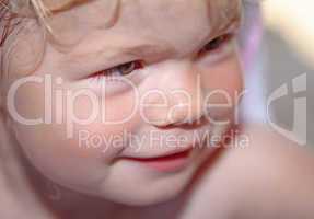 Portrait of a happy little girl close-up