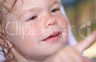 Portrait of a happy little girl close-up