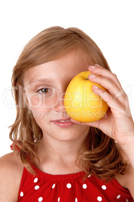 Girl holding a apple.