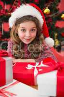 Festive little girl with gifts