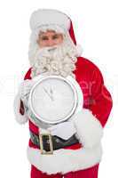 Happy santa holding a clock