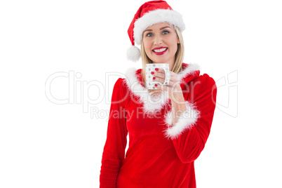 Festive blonde holding a mug