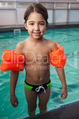 Little boy smiling at the pool