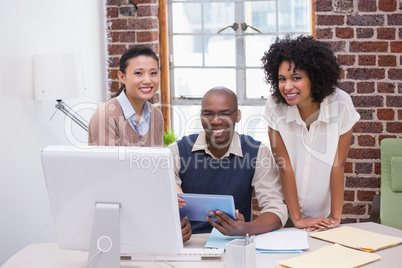 Business people using digital tablet in office