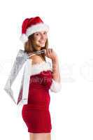 Pretty santa girl holding gift bags