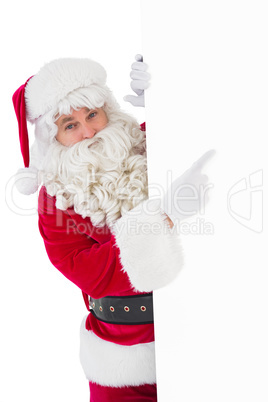 Smiling santa claus pointing poster