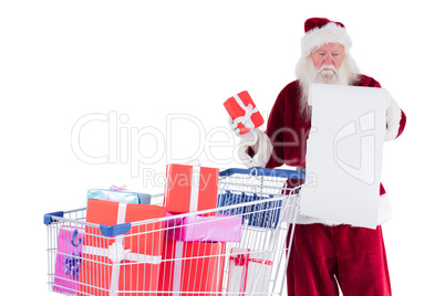 Santa spread presents with shopping cart