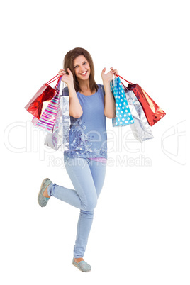 Portrait of cute young woman with shopping bags Portrait of cute young woman with shopping bags