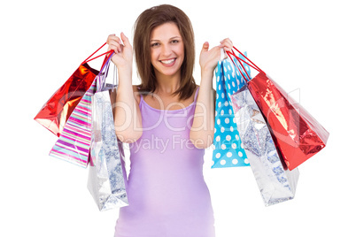 Smiling woman holding shopping bag