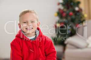 Festive little boy smiling at camera