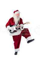 Santa Claus has fun with a guitar