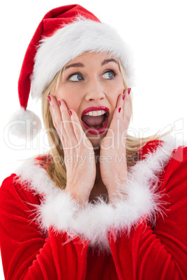 Festive blonde with hands on face