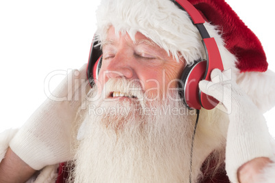 Santa Claus enjoys some music