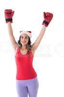 Festive brunette in boxing gloves cheering