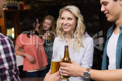 Young friends having a drink together