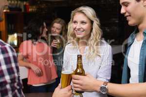 Young friends having a drink together