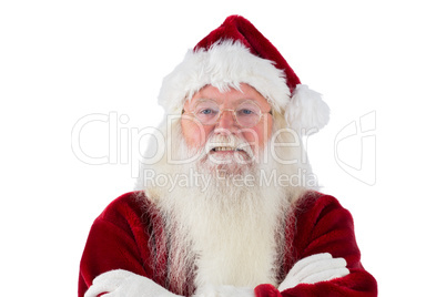 Santa smiles with folded arms