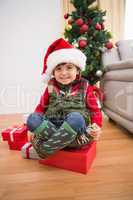 Cute festive little boy smiling at camera