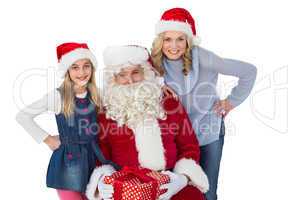 Mother and daughter with santa claus