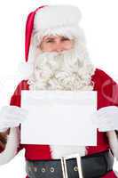 Cheerful santa claus holding page