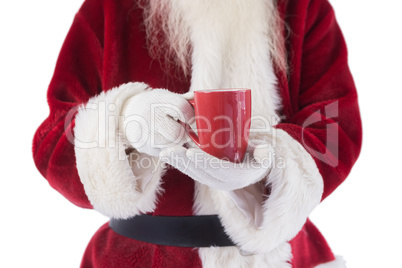 Santa holds a red cup