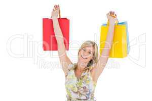 Happy blonde with shopping bags