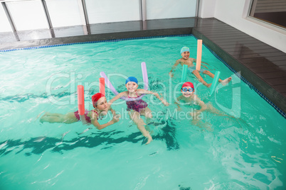 Cute little kids in the swimming pool