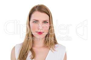 Portrait of a serious blonde woman looking at camera