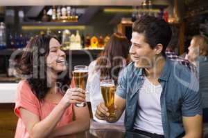 Young couple having a drink together