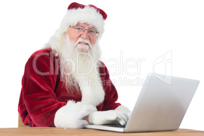 Santa surfs on the internet