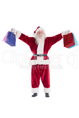 Santa holds some bags for Chistmas