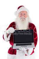Santa Claus presents a laptop