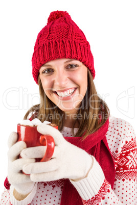 Young woman enjoying her hot coffee in the winter