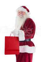 Santa carries red gift bag